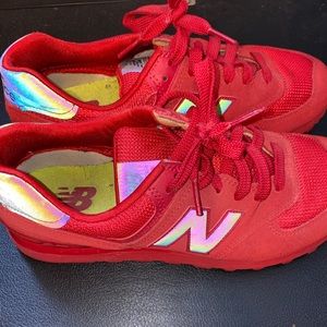 New Balance red reflective sneakers